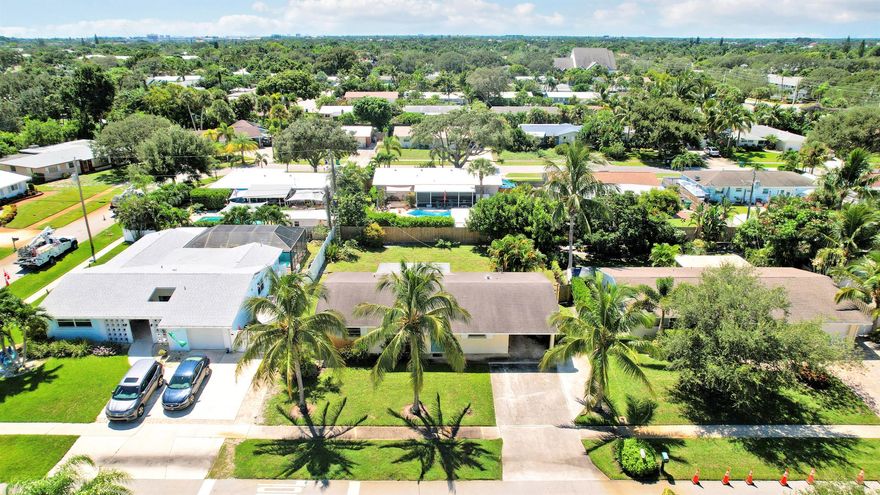 Welcome home to one of Tequesta's best communities - Ridgewood!! NO HOA! 3bed/2bath single family home. CBS construction with attached carport. Tile throughout entire living areas, with French doors leading out to Florida room. Split bedrooms. Very light and bright! Updated kitchen with stainless steel appliances. Fully fenced in HUGE back yard. Plenty of room for pool. Just minutes to the local park, beach, shopping, dining, and everything Tequesta/Jupiter has to offer.  Not much is needed to update this home or make it your own! Great for investment. Centrally located with LOTS of potential for this home! Dont let this awesome opportunity pass you by! Schedule your showing today.
