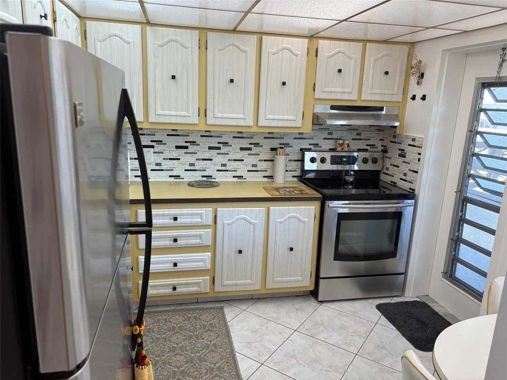 Photo of 4050 NW 42ND Avenue #415, Lauderdale Lakes, FL 33319 (MLS # B26063547)