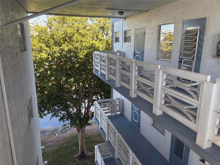 Photo of 4050 NW 42ND Avenue #415, Lauderdale Lakes, FL 33319 (MLS # B26063547)