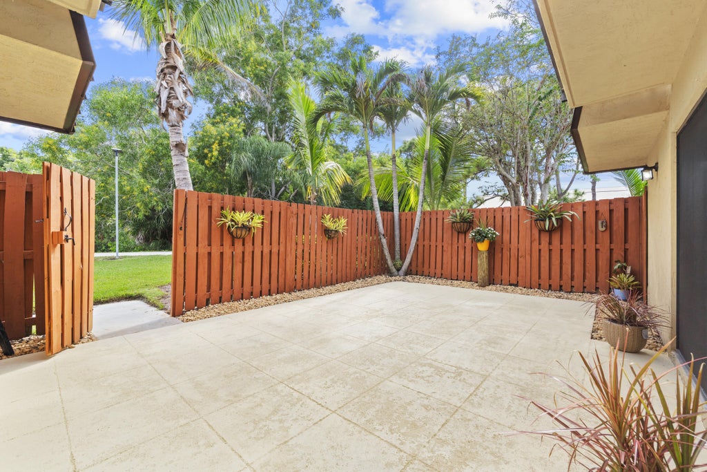 Photo of 5726 SE WINDSONG Lane #324, Stuart, FL 34997 (MLS # B26077563)