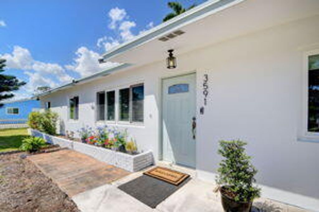 Photo of 3591 Patio Court, Lake Worth, FL 33461 (MLS # R10973643)