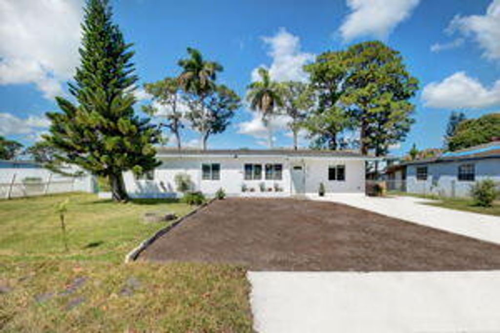 Photo of 3591 Patio Court, Lake Worth, FL 33461 (MLS # R10973643)