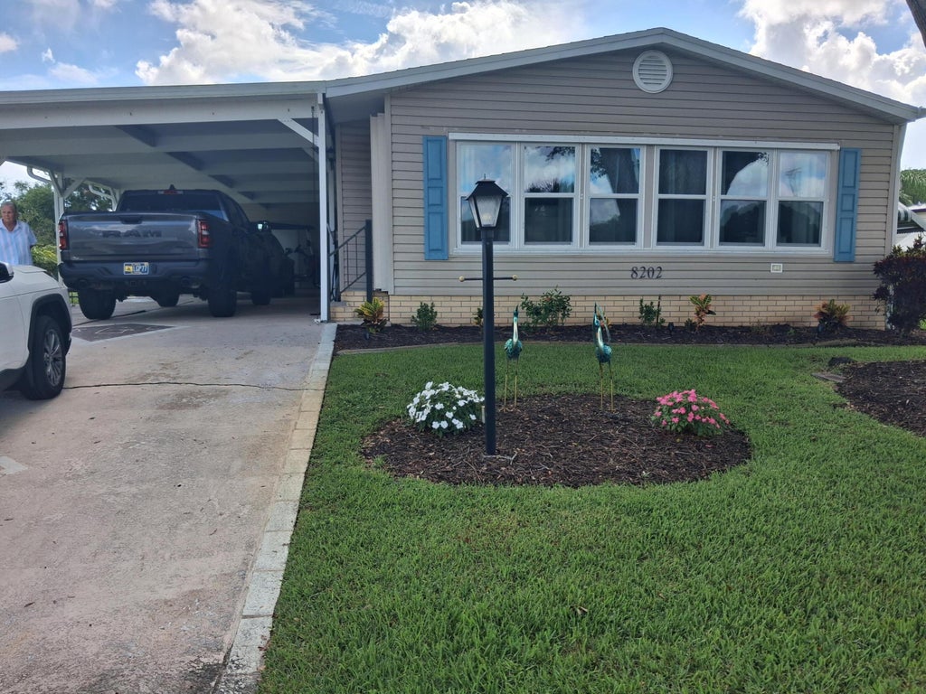 Photo of 8202 Caper Lane #8202, Port Saint Lucie, FL 34952 (MLS # B26073041)