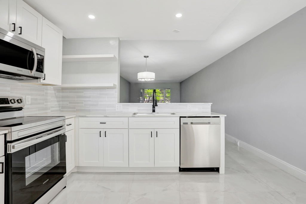 Photo of 2202 LUCAYA Bend #G2, Coconut Creek, FL 33066 (MLS # B26070206)
