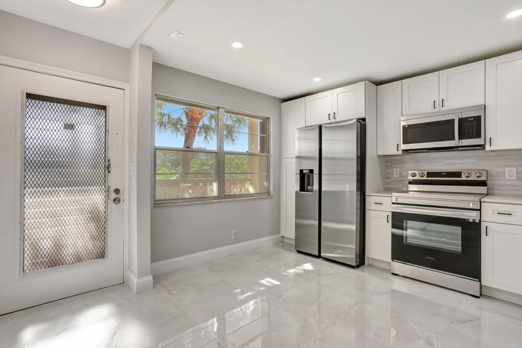 Photo of 2202 LUCAYA Bend #G2, Coconut Creek, FL 33066 (MLS # B26070206)