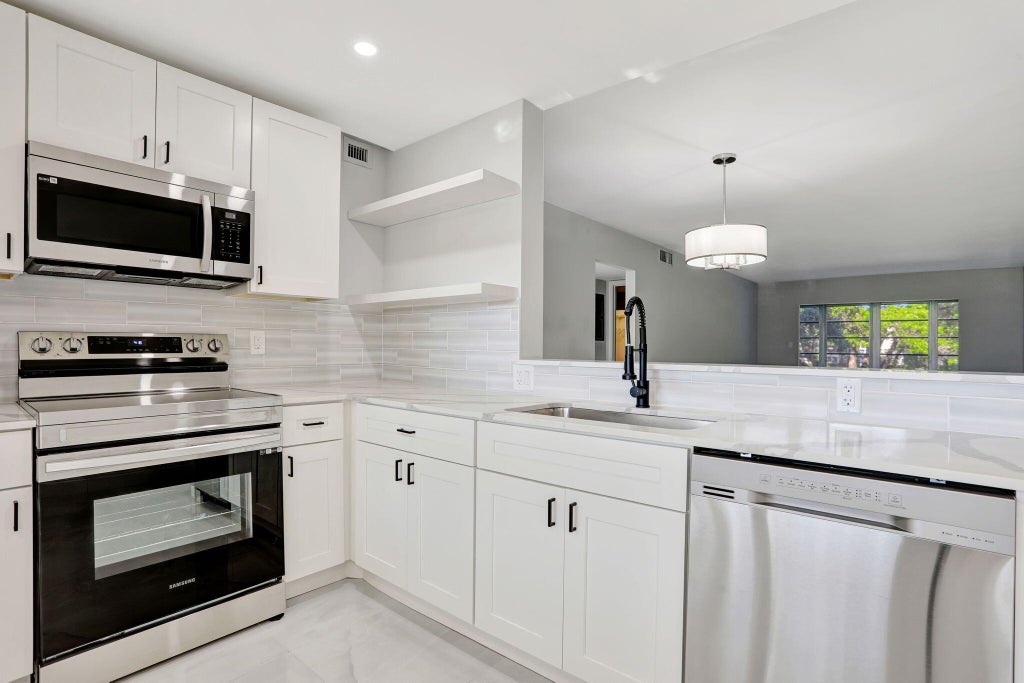 Photo of 2202 LUCAYA Bend #G2, Coconut Creek, FL 33066 (MLS # B26070206)