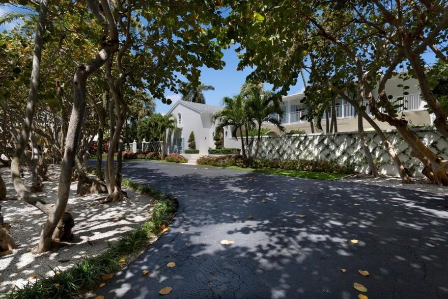 A shady tree-canopied drive to a large, walled garden courtyard with fountain creates a captivating arrival to this recently renovated Bermuda-inspired estate which fronts 150± feet on a wide, deep waterway and sits across from the Gulf Stream Golf Club.  Beautifully reimagined, this classic residence opens to outdoor spaces on both sides of each level, taking advantage of the substantial estate grounds embraced in lush greenery.  By manicured lawns on the water side, the outdoor living/dining areas of the long lanai overlook the inviting pool terrace served by a summer kitchen pavilion. The information herein is deemed reliable and subject to errors, omissions or changes without notice. The new dock has a 20,000Â±-pound boat lift.  A walled parking court is by the two-bay garage. 

DISCLAIMER: The written and verbal information provided including but not limited to prices, measurements, square footages, lot sizes, calculations and statistics have been obtained and conveyed from third parties such as the applicable Multiple Listing Service, public records as well as other sources. All information including that produced by the Sellers or Listing Company are subject to errors, omissions or changes without notice and should be independently verified by any prospect for the purchase of a Property.  The Sellers and Listing Company expressly disclaim any warranty or representation regarding all information.  Prospective purchasers' use of this or any written and verbal information is acknowledgement of this disclaimer and that Prospects shall perform their own due diligence.  Prospective purchasers shall not rely on any written or verbal information provided when entering into a contract for sale and purchase.  Some affiliations may not be applicable to certain geographic areas. If your property is currently listed, please do not consider this a solicitation.   In the event a Buyer defaults, no commission will be paid to either Broker on the Deposits retained by the Seller. "No Commissions Paid until Title Passes."    Buyer pays title insurance, Florida documentary stamps, and all other closing costs for New Construction and land use. Copyright 2016 Listing Company.  All Rights Reserved.