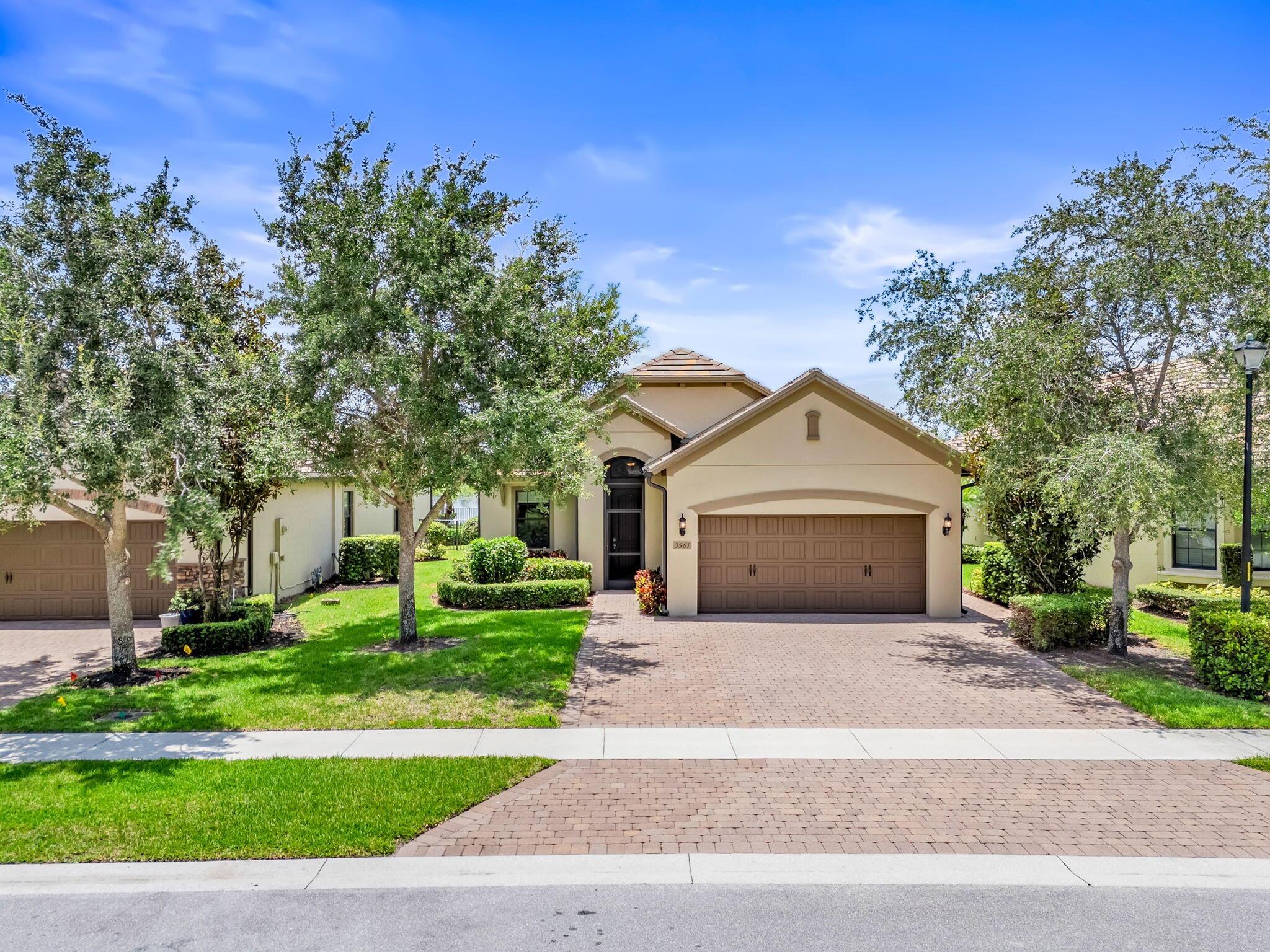 This pristine lakefront home built in 2014 and located in the highly desirable Wellington neighborhood of Castellina, offers 2 bedrooms plus an open den/office, 2 bathrooms, and a 2-car garage. that runs through the main living areas and rich wood floors warm both bedrooms. The kitchen is designed for both form and function, featuring a spacious center island, granite countertops, stainless steel appliances, and a gas range.Enjoy the South Florida lifestyle on your screened in patio while overlooking the lake views and fully fenced yard. Additional highlights include freshly painted interior, complete impact windows and doors and an HVAC system installed in 2022. Conveniently located near shops, dining, Equestrian venues and all the best Wellington has to offer.
