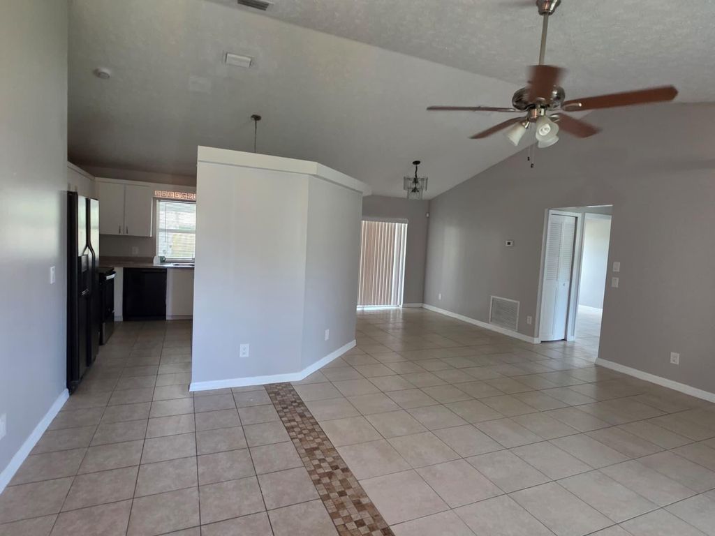 Photo of 986 SW North Globe Avenue, Port Saint Lucie, FL 34953 (MLS # R11119298)