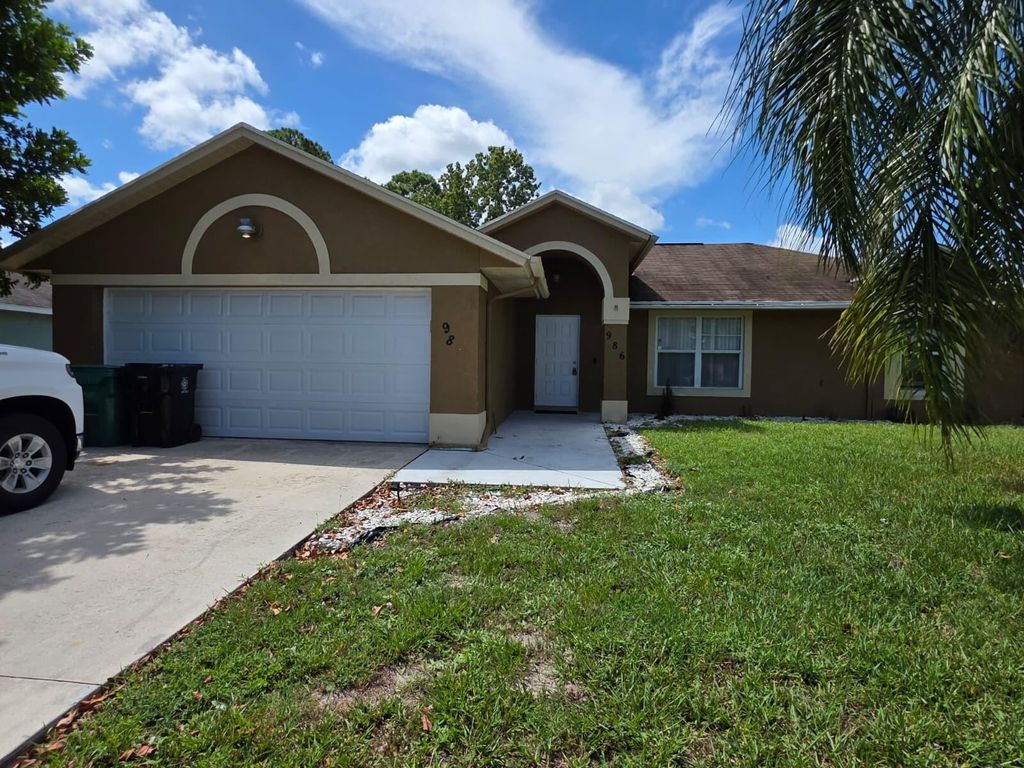 Photo of 986 SW North Globe Avenue, Port Saint Lucie, FL 34953 (MLS # R11119298)