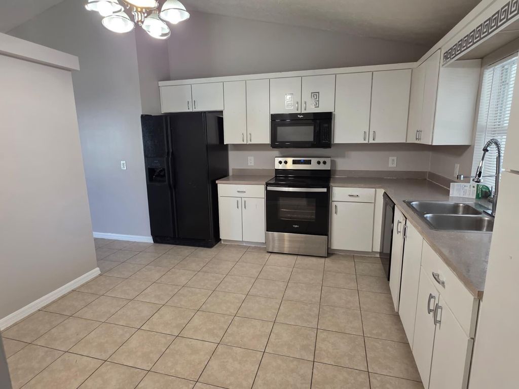 Photo of 986 SW North Globe Avenue, Port Saint Lucie, FL 34953 (MLS # R11119298)