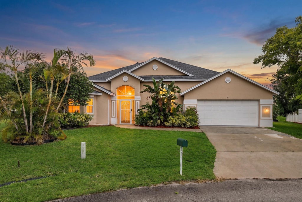 Photo of 301 SW Buzby Court, Port Saint Lucie, FL 34953 (MLS # B26045727)