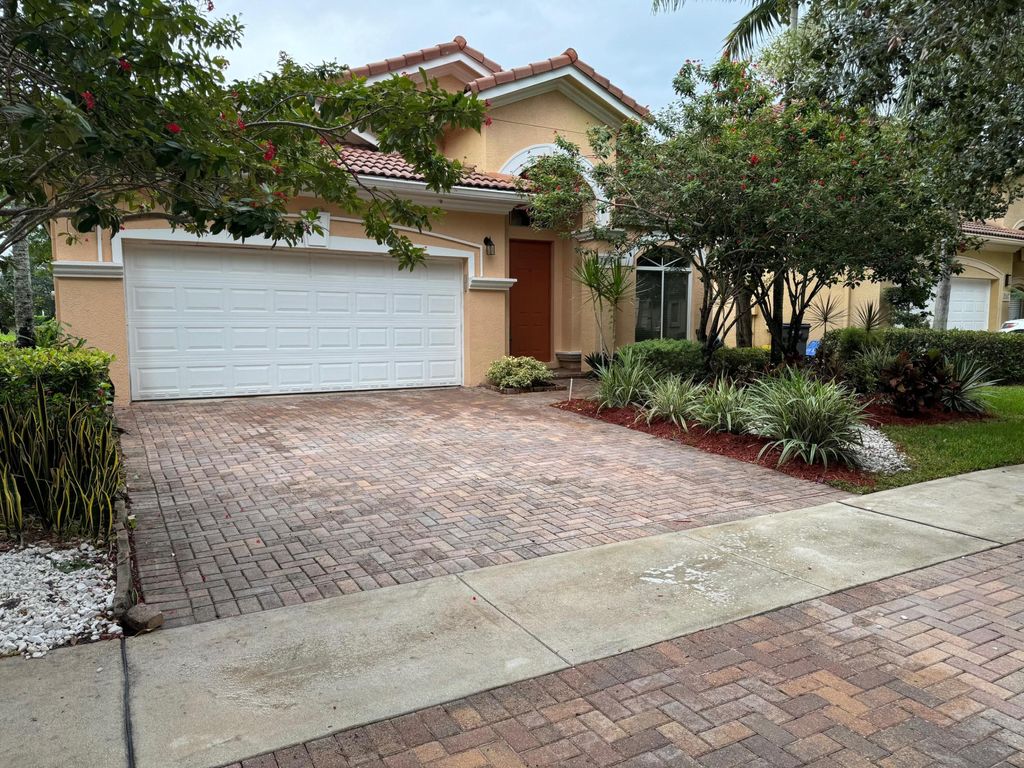 Photo of 759 Gazetta Way, West Palm Beach, FL 33413 (MLS # R10996135)