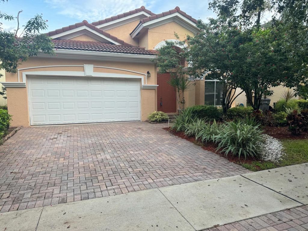 Photo of 759 Gazetta Way, West Palm Beach, FL 33413 (MLS # R10996135)