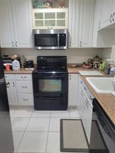 Great deal and ready for move in! Impeccably well maintained 2 bedroom/2 bath condo in quiet, secluded area of Hawaiian Gardens. Corner unit on first floor with assigned parking directly in front of entrance. This is a 55+ community with lots of amenities and close to hospital, shopping, and dining. Owner will consider short term renting (up to 6 m0nths) at $1600/mo. Owner also will finance with appropriate down payment and credit to qualified buyers. One buyer must meet age restrictions as well. Please contact listing agent for more information and viewing.