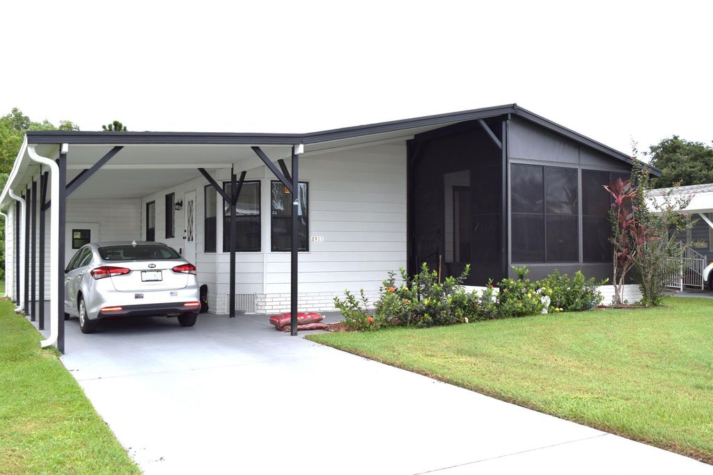 Photo of 2911 Fiddlewood Circle, Port St Lucie, FL 34952 (MLS # R10909319)