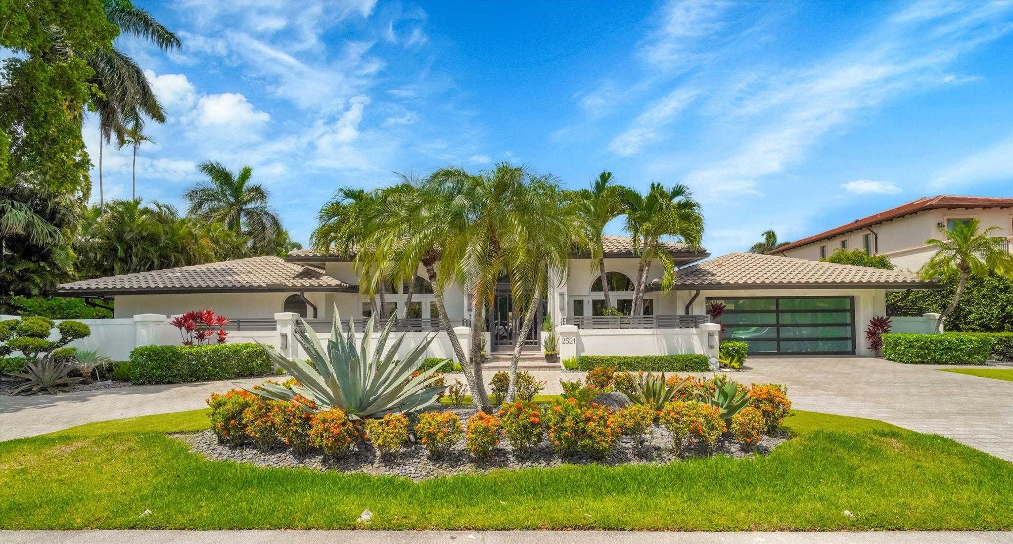 The combination of luxury features and a prime location makes this a dream home for anyone, especially boating enthusiasts. Beautiful 4 bedroom, 4.5 bath single story residence located in sought after Harbor Beach neighborhood. 120' of waterfront with dock including 200-amp pedestal for large yacht. 135' wide canal with no fixed bridges. Heated pool with spa, summer kitchen, covered gazebo and bar for outdoor dining and entertaining. Executive den/office and formal dining room. Family room with breakfast area and wet bar. Primary suite with spa-style bathroom of nearly 1200 square feet. Stylish interior finishes, 24-hour security, beach club and marina.
