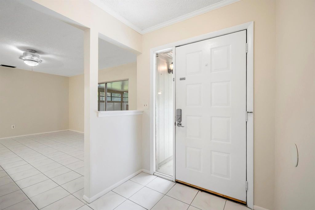 Photo of 4081 NW Cinnamon Tree Circle, Jensen Beach, FL 34957 (MLS # R11113705)