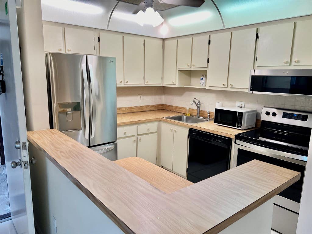 Photo of 9718 S BELFORT Circle #108, Tamarac, FL 33321 (MLS # B26061919)