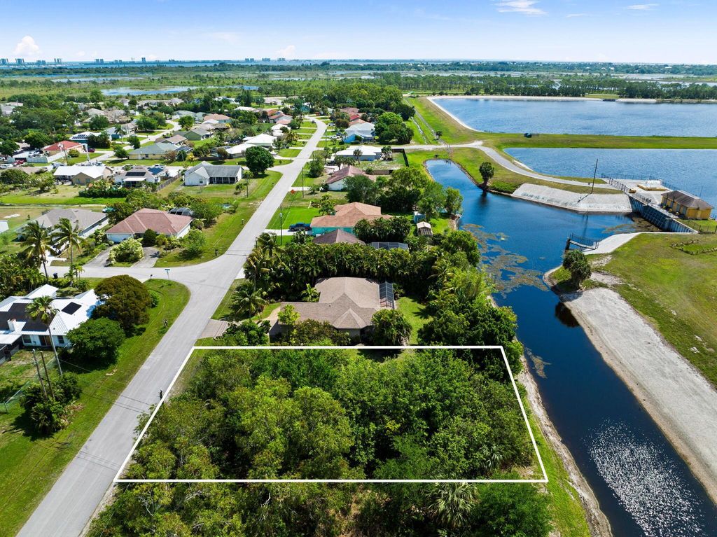 Photo of 2668 SE Blackwell Drive, Port Saint Lucie, FL 34953 (MLS # R10973954)