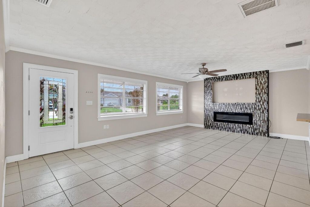 Photo of 143 SW Grove Avenue, Port Saint Lucie, FL 34983 (MLS # F10518959)