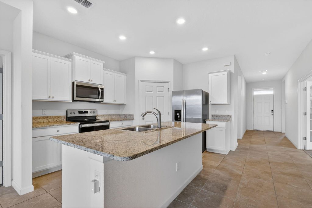 Photo of 10552 SW Toren Way, Port Saint Lucie, FL 34987 (MLS # B26023385)