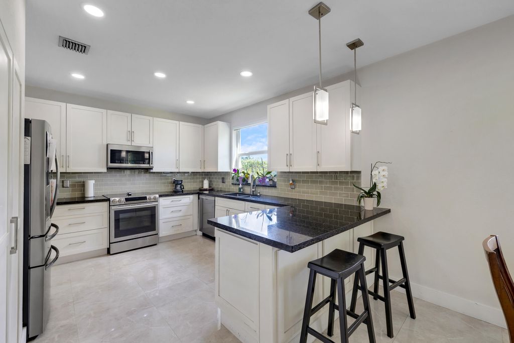 Photo of 16773 NW 16th Street, Pembroke Pines, FL 33028 (MLS # B26035629)