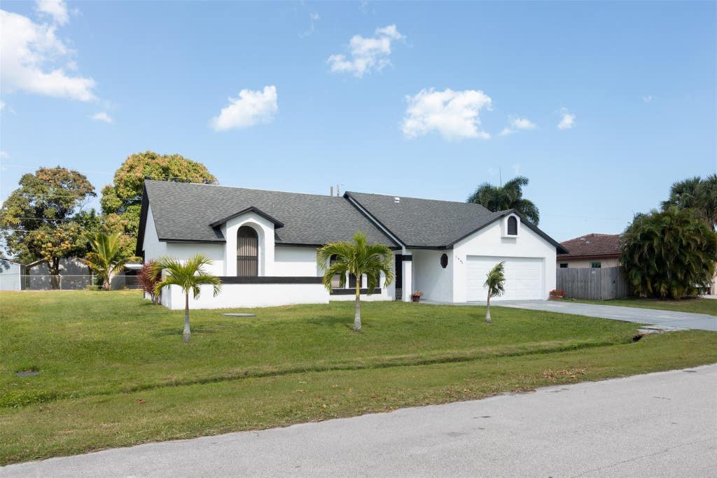 Photo of 2442 SE University Terrace, Port Saint Lucie, FL 34952 (MLS # F10420692)