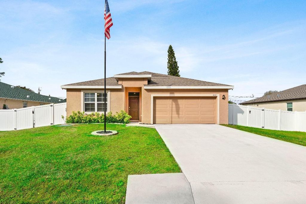 Photo of 1858 SW Lennox Street, Port Saint Lucie, FL 34953 (MLS # R11158791)