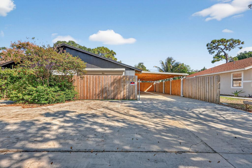 Photo of 5785 SE Collins Avenue, Stuart, FL 34997 (MLS # R11152066)