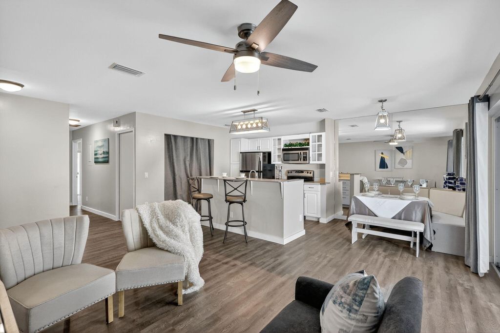 Photo of 5785 SE Collins Avenue, Stuart, FL 34997 (MLS # R11152066)