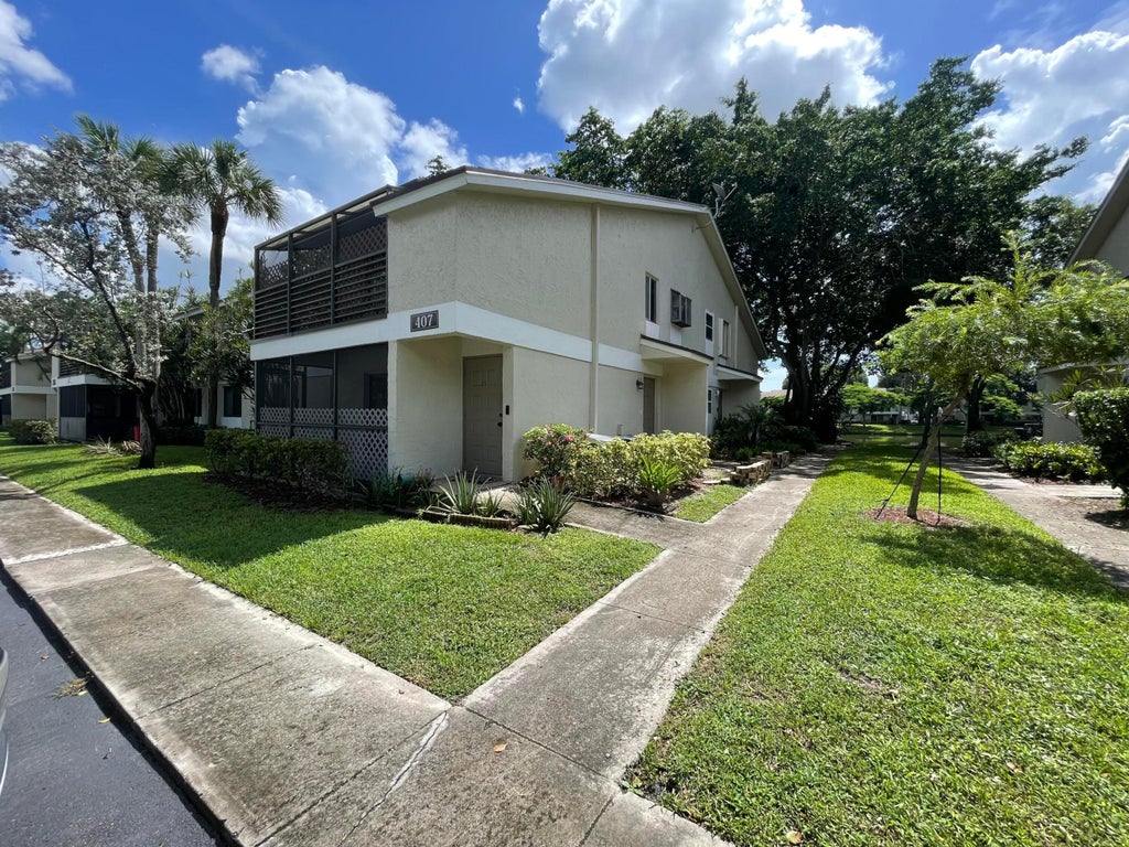 Photo of 407 GARDENS Drive #102, Pompano Beach, FL 33069 (MLS # B26074997)