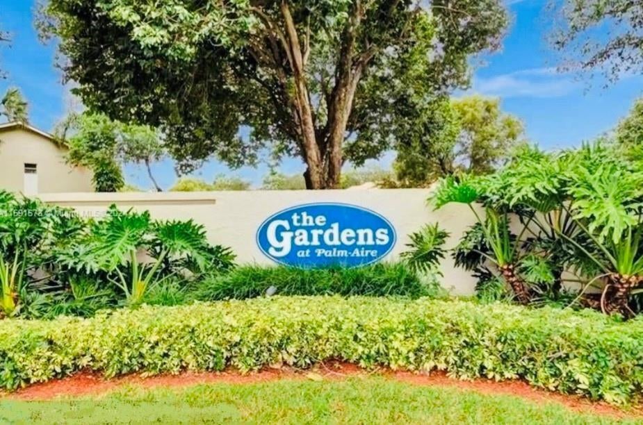 Photo of 407 GARDENS Drive #102, Pompano Beach, FL 33069 (MLS # B26074997)