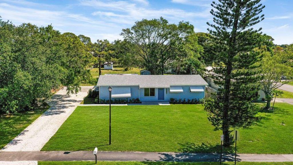 Photo of 309 S Loxahatchee Drive, Jupiter, FL 33458 (MLS # R11154832)