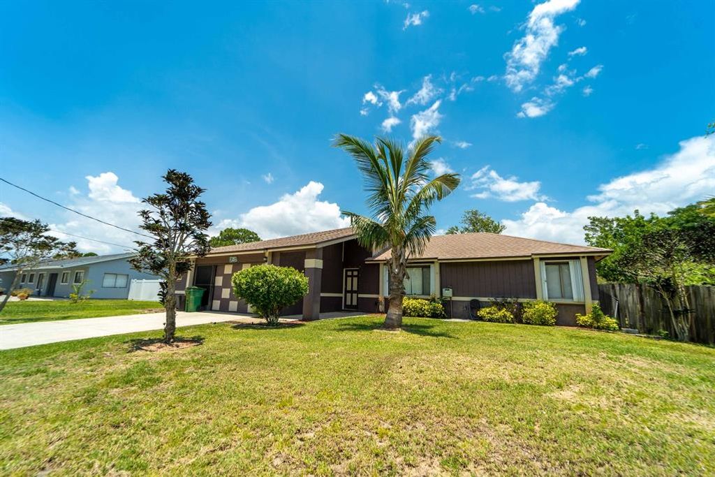 Photo of 767 SE Chaloupe Avenue, Port Saint Lucie, FL 34983 (MLS # R10804060)