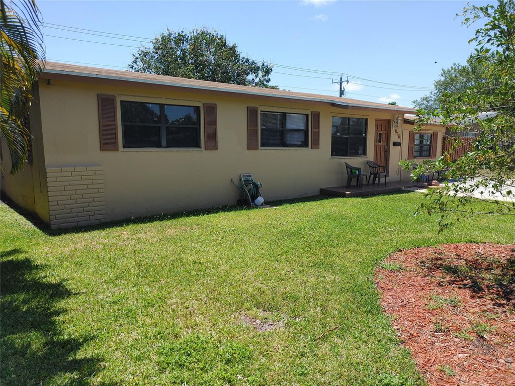 Photo of 846 W Jasmine Drive, West Palm Beach, FL 33403 (MLS # F10438581)