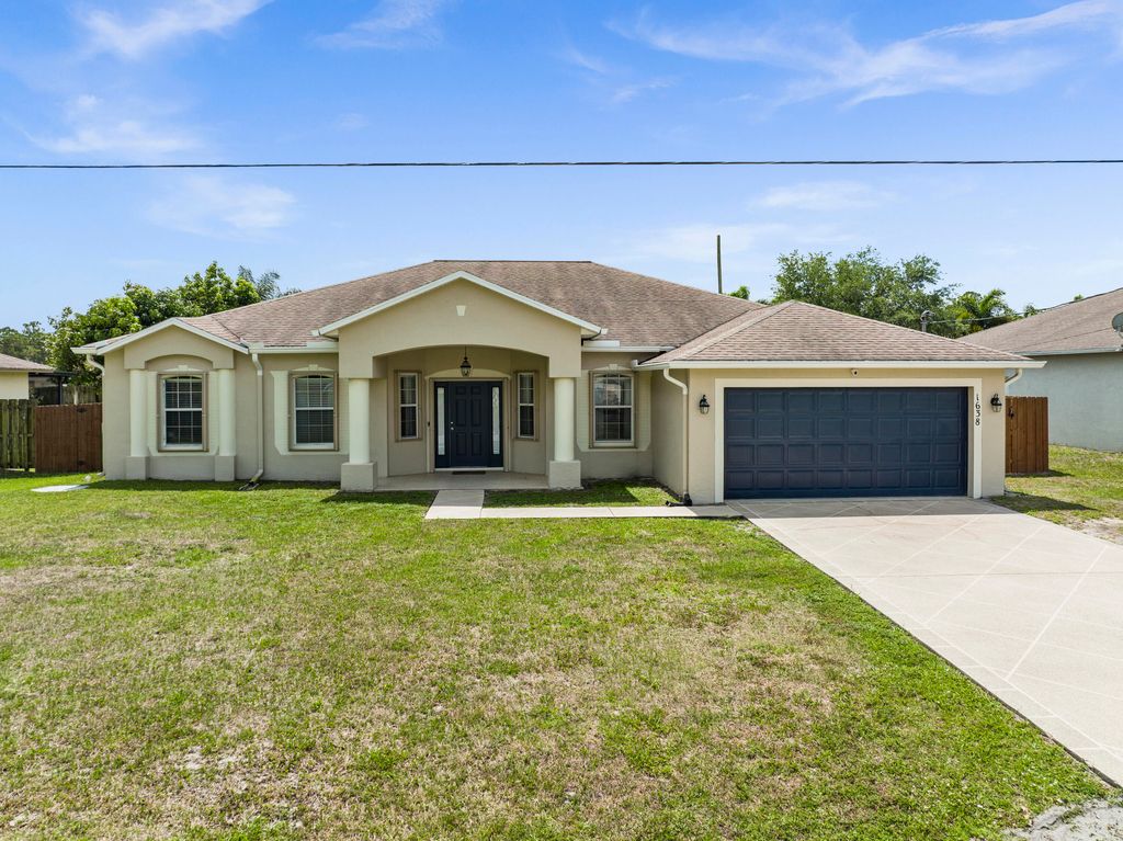 Photo of 1638 SW Whipple Avenue, Port Saint Lucie, FL 34953 (MLS # R10791117)