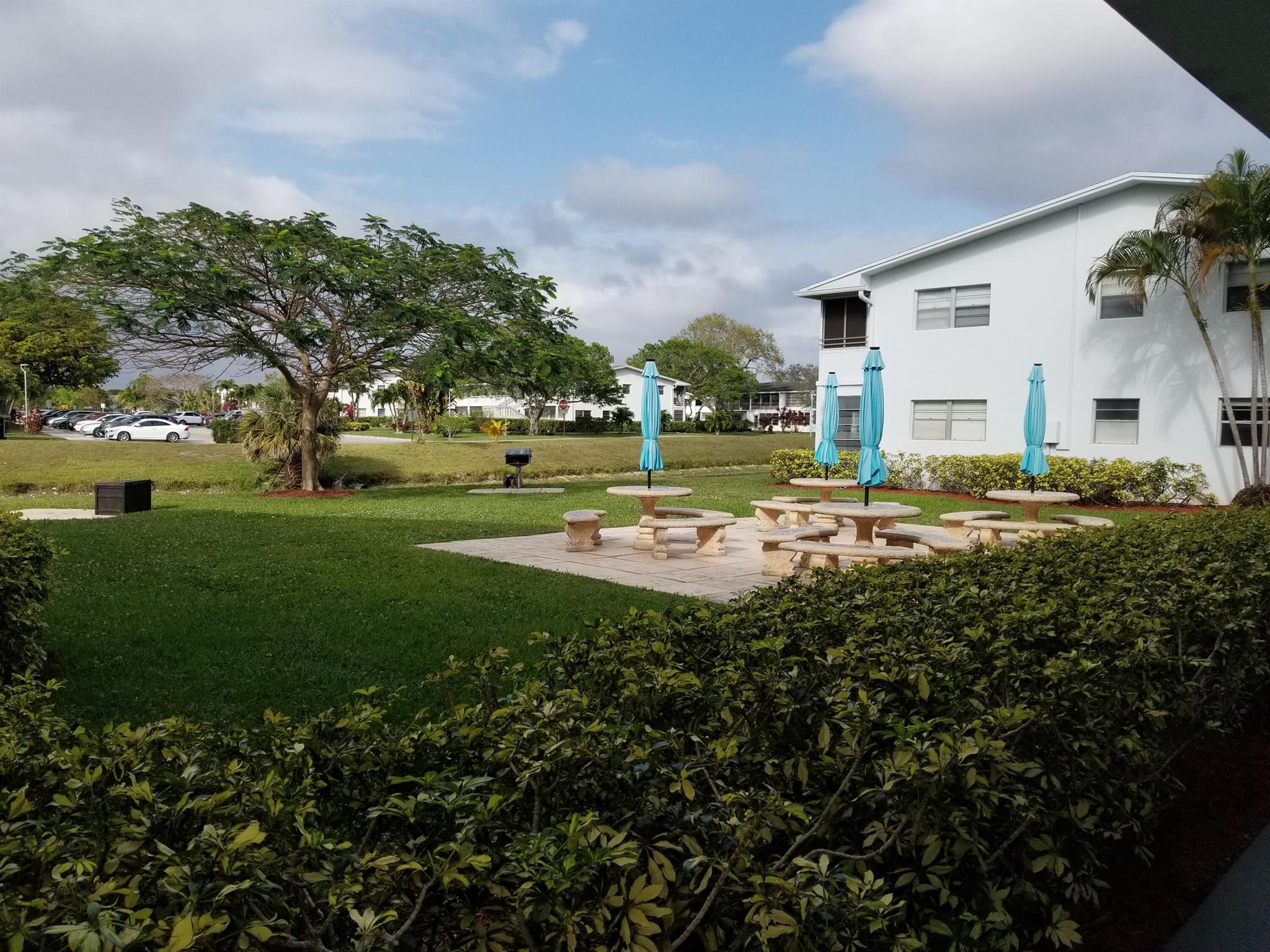 Condominium unit is situated in the desirable Century Village community of Deerfield Beach, FL, this spacious 1-bedroom, 1.5-bath residence features tile flooring throughout for easy maintenance. The unit includes convenient parking just steps from your entrance. Residents enjoy access to an array of amenities and a robust calendar of activities available year-round, including pickleball and tennis courts, water aerobics, dance classes, ceramics, and a putting course. On-site dining at the cafe and performances at the community theater offer additional opportunities for recreation and social engagement. The property is ideally located near local beaches, shopping, dining, downtown areas, and Boca Raton, providing convenient access to all that South Florida has to offer.