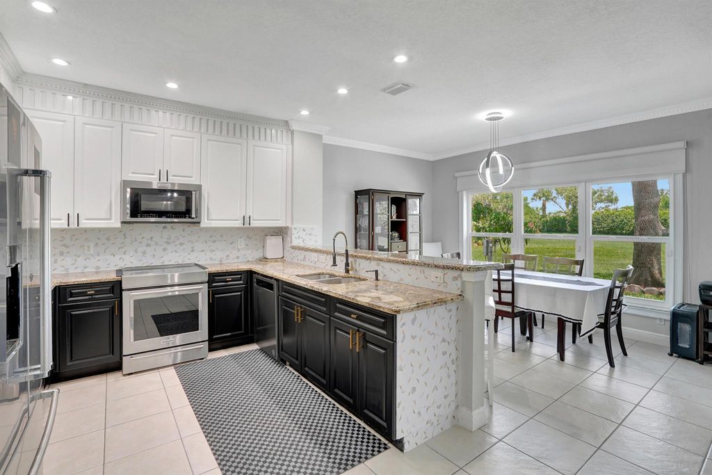 Photo of 6896 Lantern Key Drive, Lake Worth, FL 33463 (MLS # R10932346)