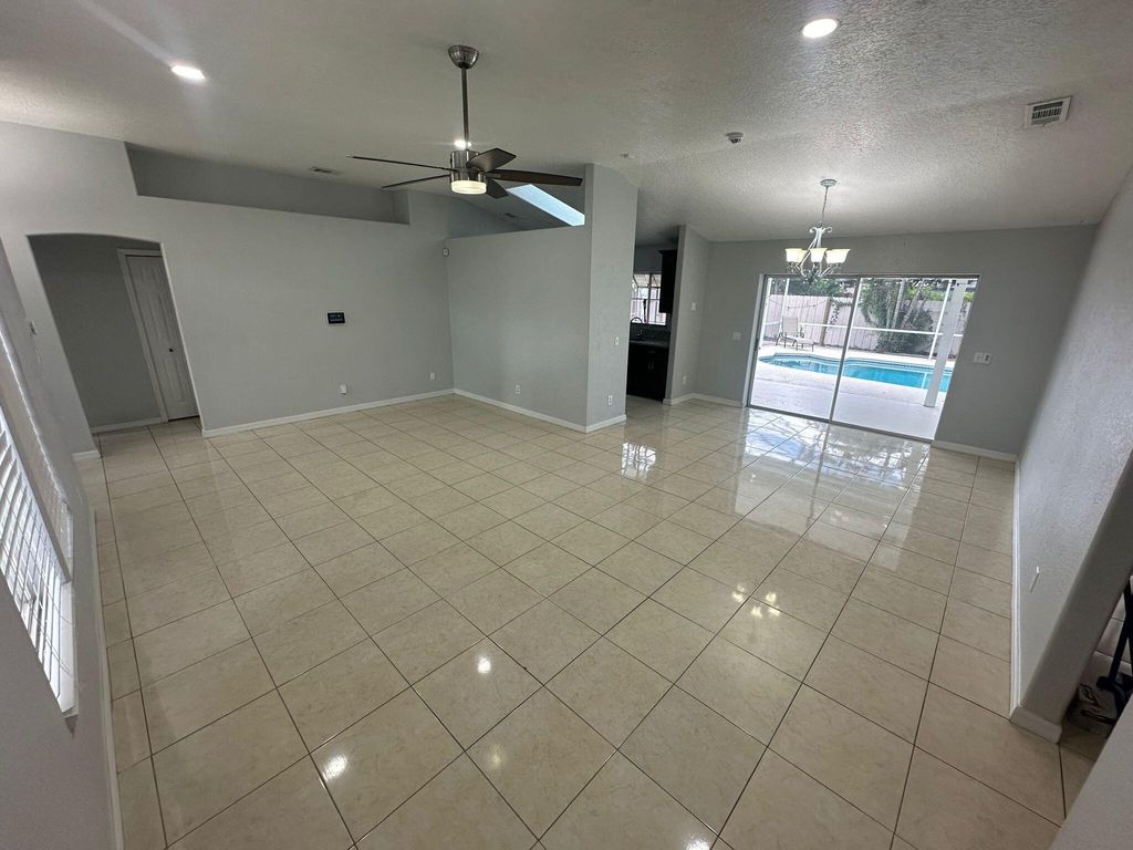 Photo of 691 SE Voltair Terrace, Port Saint Lucie, FL 34953 (MLS # R11027939)