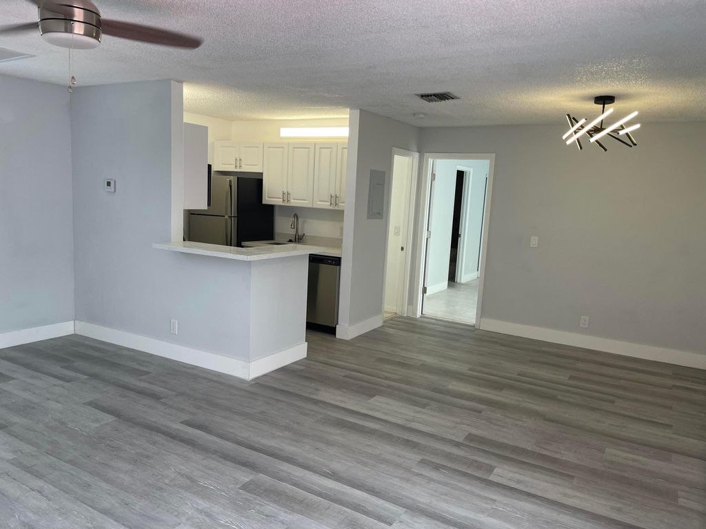 Photo of 35 Crossings Cir Circle #F, Boynton Beach, FL 33435 (MLS # R11086943)