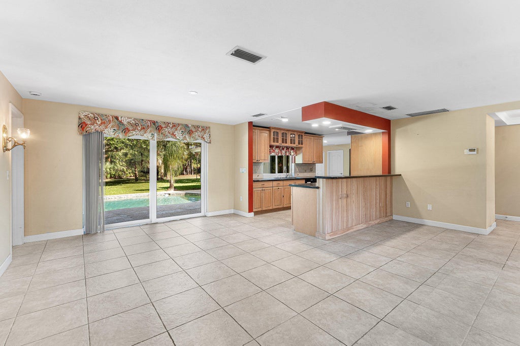 Photo of 8645 Square Lake Drive, Palm Beach Gardens, FL 33418 (MLS # B26067889)