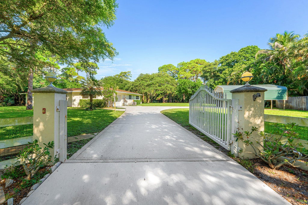 Photo of 8645 Square Lake Drive, Palm Beach Gardens, FL 33418 (MLS # B26067889)