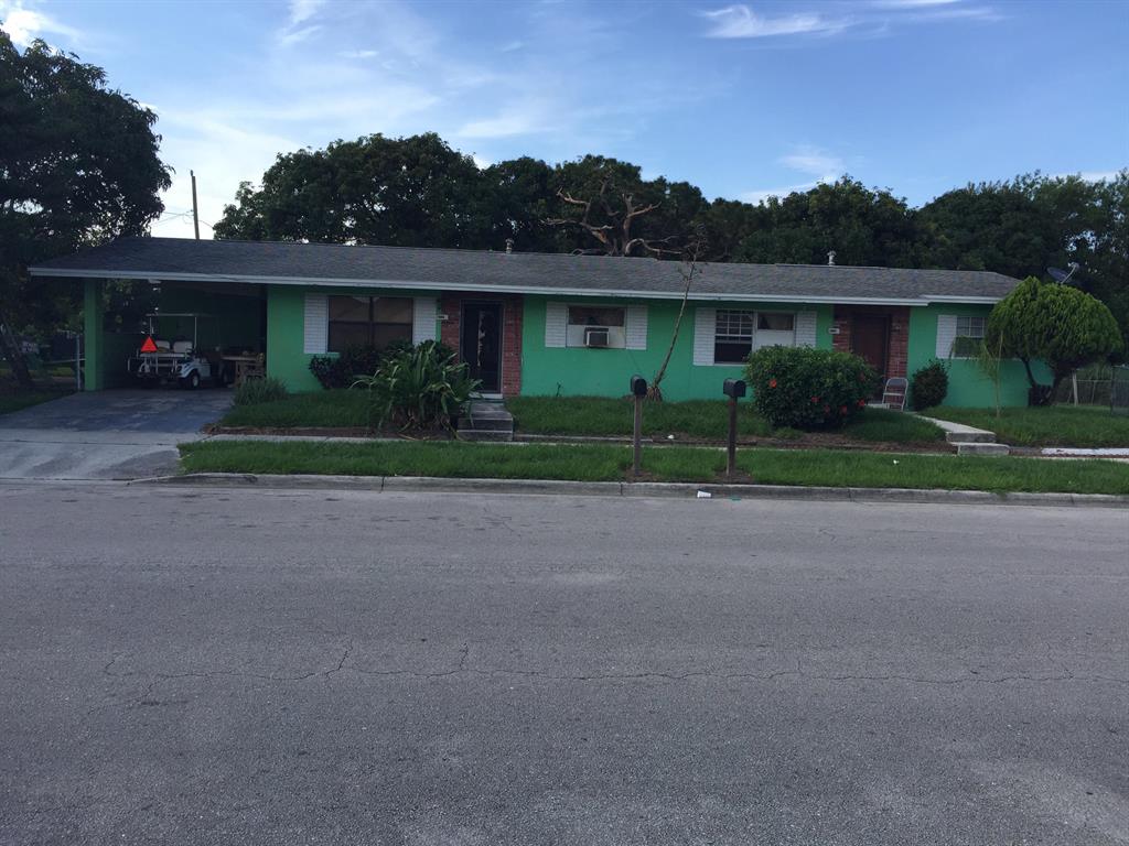 Opportunity knocks. Great investment opportunity on this CBS duplex. Lease in place both sides rented for $500 which is below market value, long term tenants. One side is equipped with car port and washroom. Corner lot. Hurry as this will not last long!!