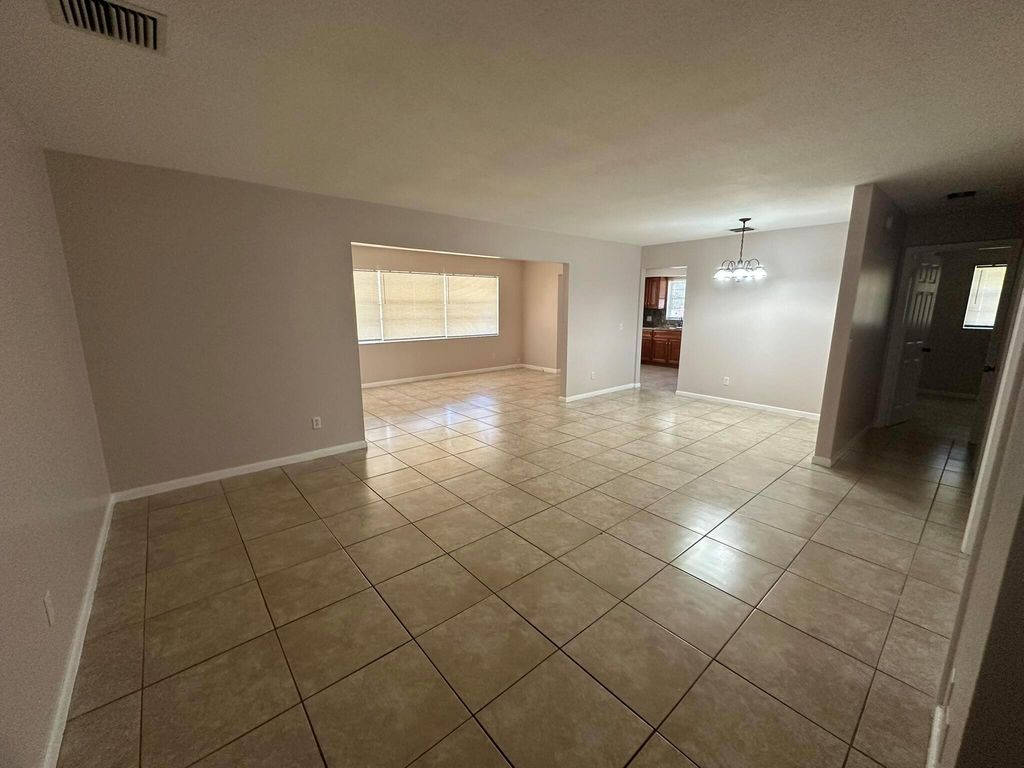 Photo of 744 SE Fallon Drive, Port St Lucie, FL 34983 (MLS # R11093557)