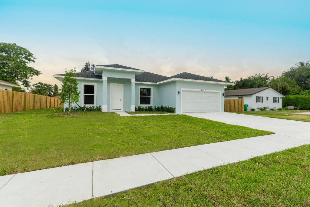 Photo of 4084 Linda Lane, Palm Springs, FL 33406 (MLS # R11133098)