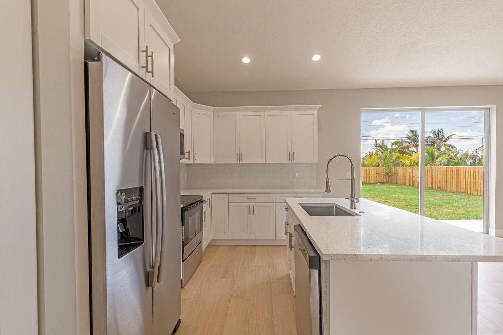 Photo of 4084 Linda Lane, Palm Springs, FL 33406 (MLS # R11133098)