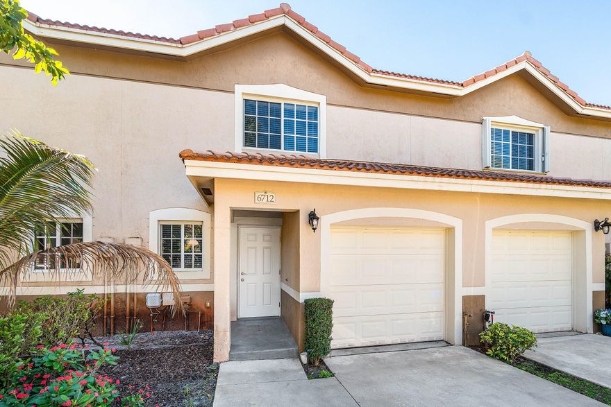 This spacious townhome offers great lakeside views with a refreshed interior. The freshly painted interior creates a welcoming atmosphere, accentuated by new fixtures and new plush carpeting on the stairs and upper level. The kitchen features granite countertops and an island that is perfect for casual meals or entertaining guests. The private patio, bordered by fences on either side, offers a quiet retreat with picturesque views of the water, making it an ideal spot for relaxation or outdoor dining. This townhome is turn-key, ready for a homeowner seeking a peaceful abode or an investor aiming for immediate rental potential.

Residents enjoy the numerous amenities provided by the HOA, including cable, a sparkling community pool, a fun splash fountain for kids, a fitness center, and a well-equipped grill and picnic area. The community room and playground are perfect for social gatherings, while the scenic lake and walking trail offer opportunities for leisurely strolls or invigorating runs. Located near Green Cay Nature Preserve and a short drive from the stunning beaches of Boynton and the vibrant scene of Delray's Atlantic Avenue.