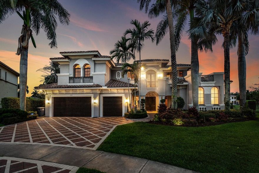 Rarely available, and truly one of a kind custom Bordeaux model, in the Oaks at Boca Raton. This exquisite home sits on one of the community's most coveted homesites--an over one-third acre cul-de-sac lot with serene lake views and exceptional privacy, enhanced by additional land on both sides. The expansive grounds offer ample room for a playground, sports court, or future outdoor enhancements.This 5-bedroom, 4 full and 2 half bath residence offers 5,480 square feet of refined living space with a three-car garage and whole-house generator. The home makes a striking first impression with a 22-foot ceiling in the main living room. The main level features a private primary suite, dedicated office, and theatre room. Upstairs includes three en-suite bedrooms, an additional bedroom, and a