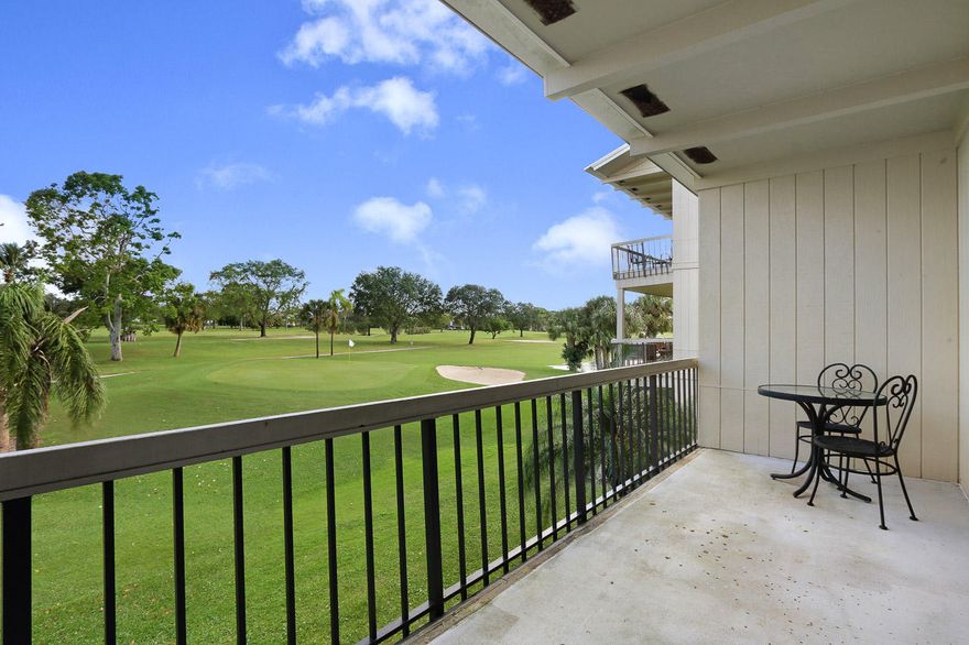 1st floor end unit! Awesome deep and wide golf views plus you're tucked way back off the green so you don't get strays. 2 patios - 1 open air and 1 screened. Gated with a designer golf course, pro shop, putting green, driving range, heated pools, har-tru tennis courts and a clubhouse. All this and you're only 20 minutes to everything: Highways, beaches, restaurants. Mandatory cc membership $625/qtr.